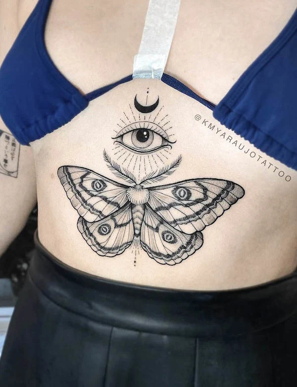 Eye and butterfly underboob tattoo by @kmyaraujotattoo