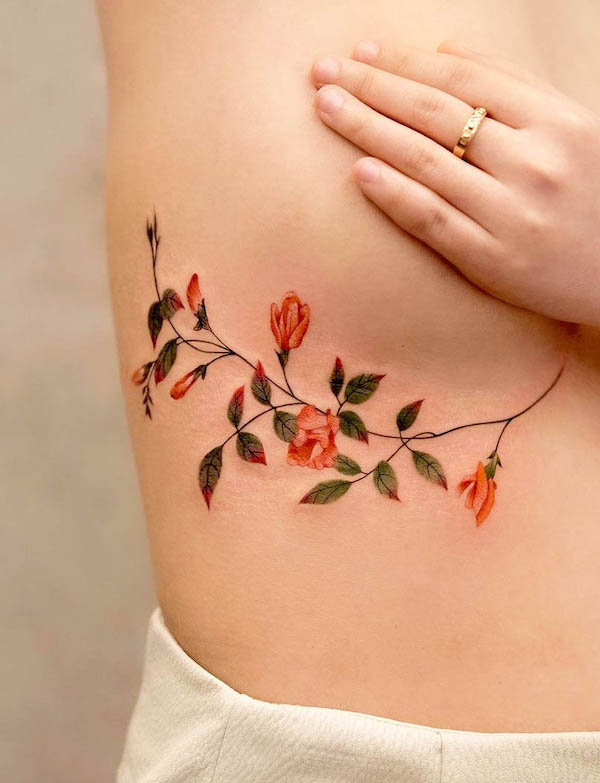 Girly floral underboob tattoo by @newtattoo_qiqi