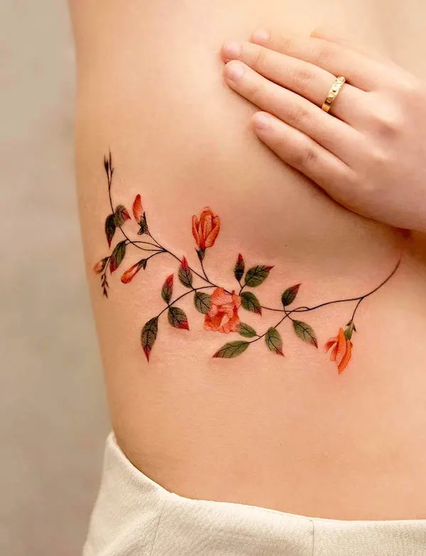 Girly floral underboob tattoo by @newtattoo_qiqi