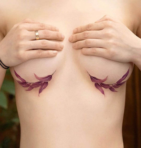 Purple leaves underboob tattoo by @newtattoo_qiqi