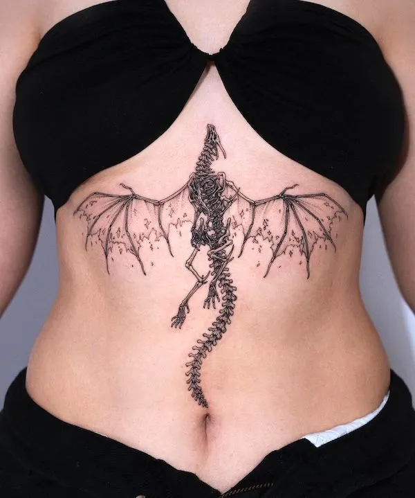 Skeleton dragon sternum tattoo by @tattooer_intat