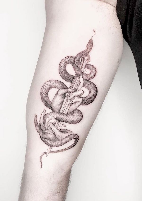 Snake and dagger witchy tattoo by @durulpaksoy