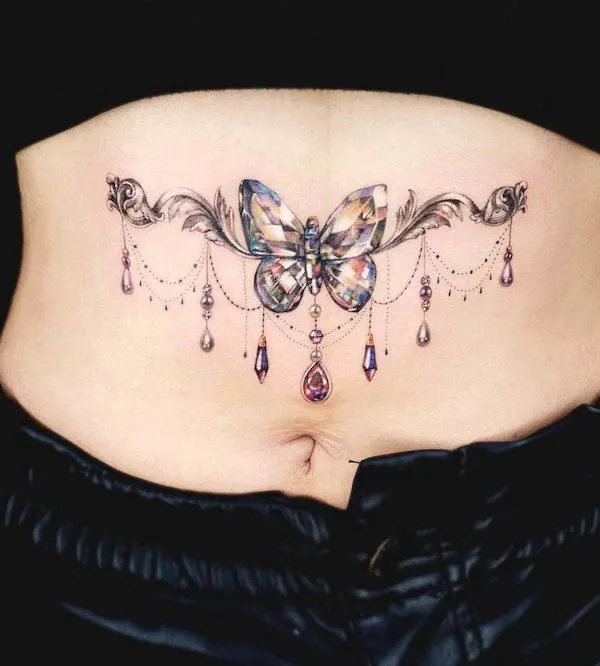 Stunning crystal underboob tattoo by @tattooist_siia