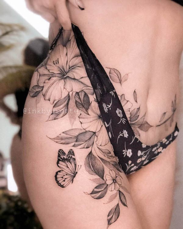 Thigh and waist floral tattoo by @inkbygrettel