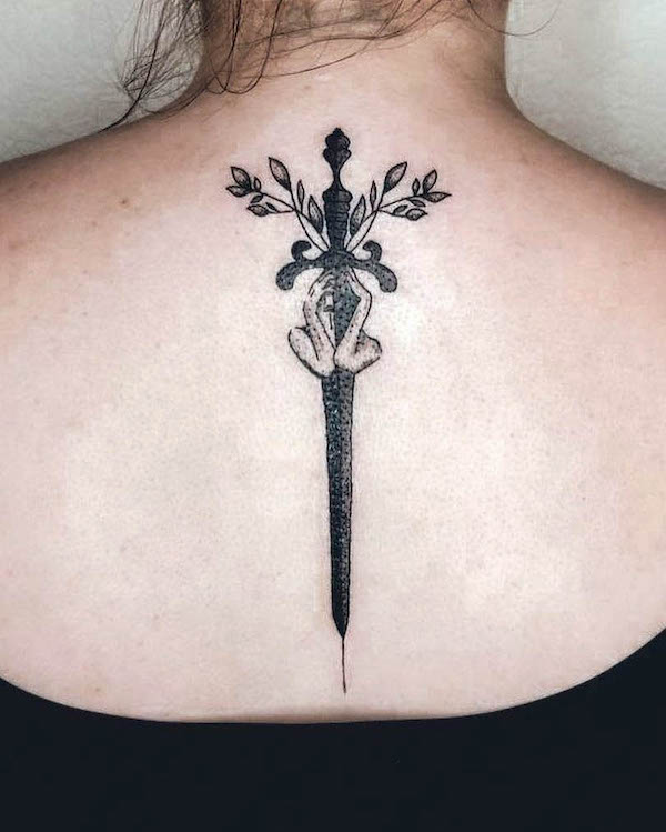 Unique dagger girl spine tattoo by @_roh_ink_