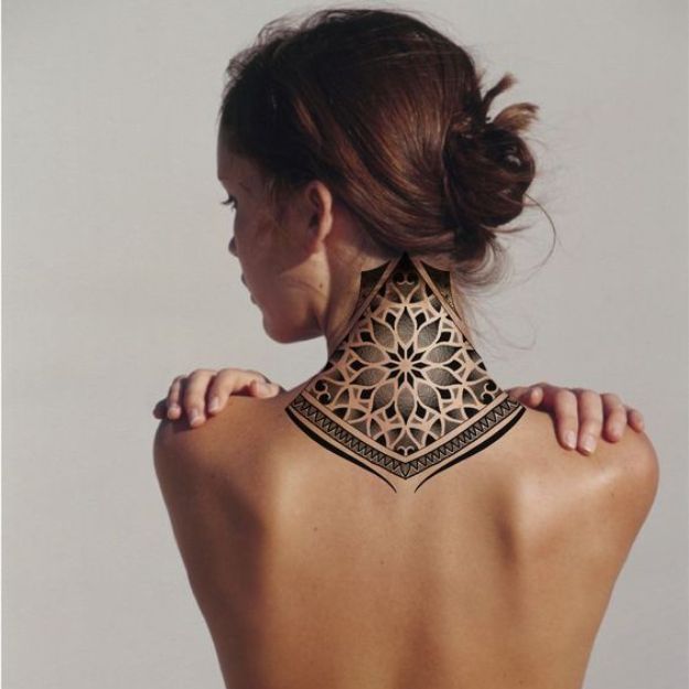 Women back of neck tattoo