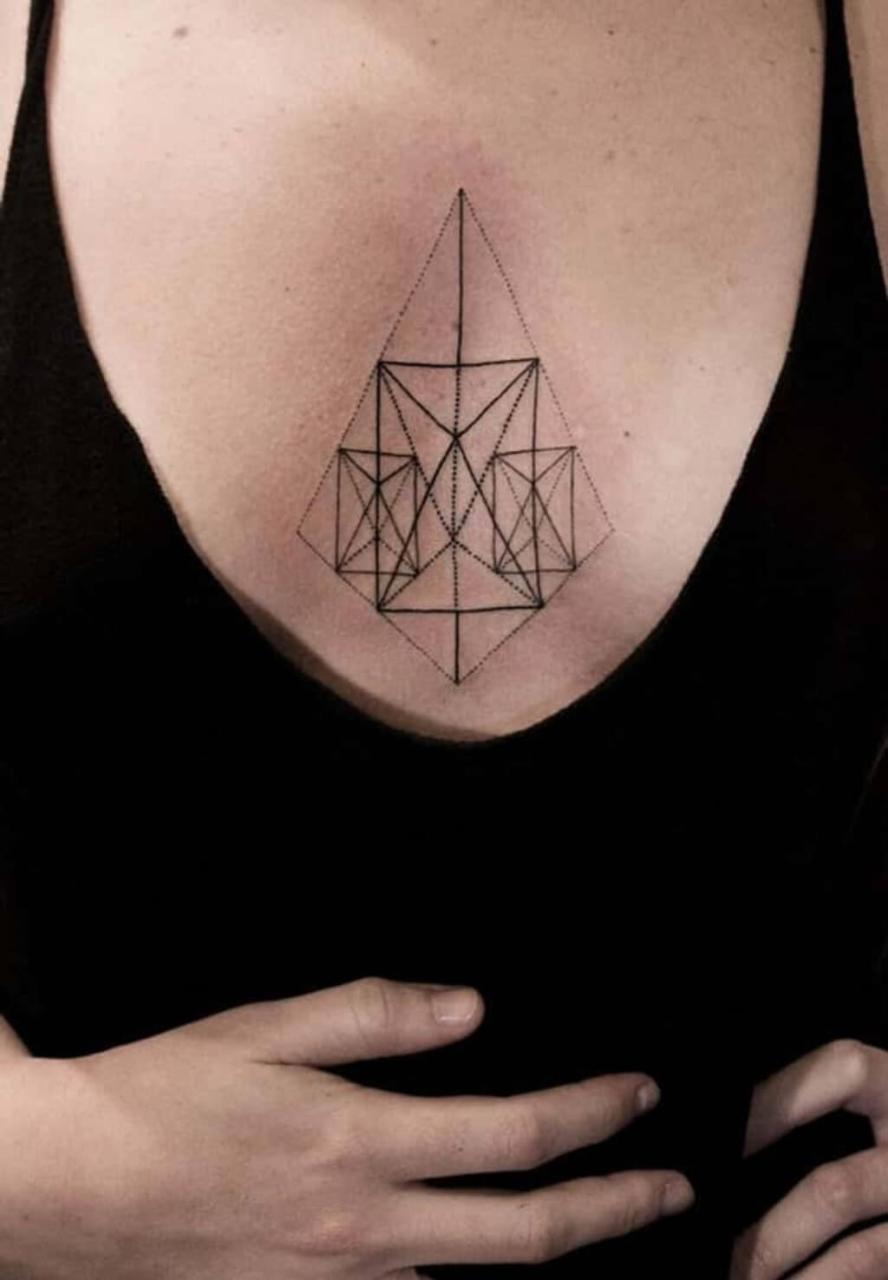 unique small female chest tattoos