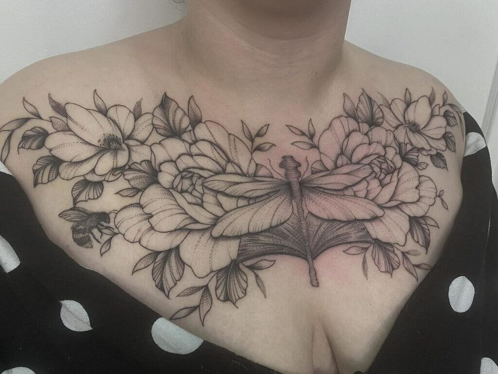 unique small female chest tattoos