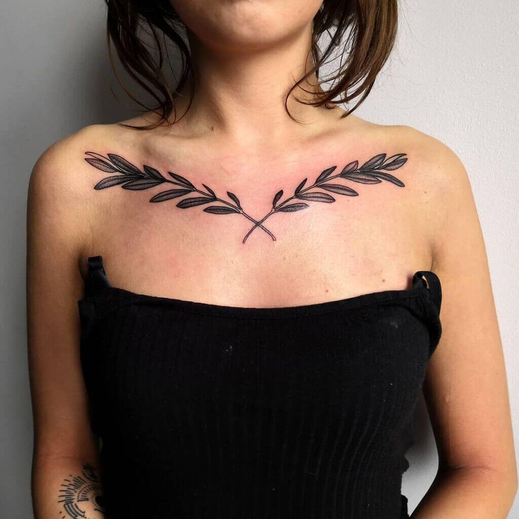 unique small female chest tattoos