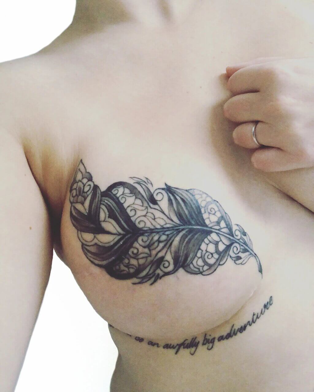 unique small female chest tattoos