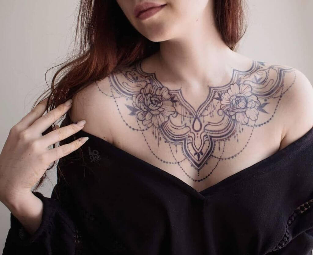 breast tattoo design