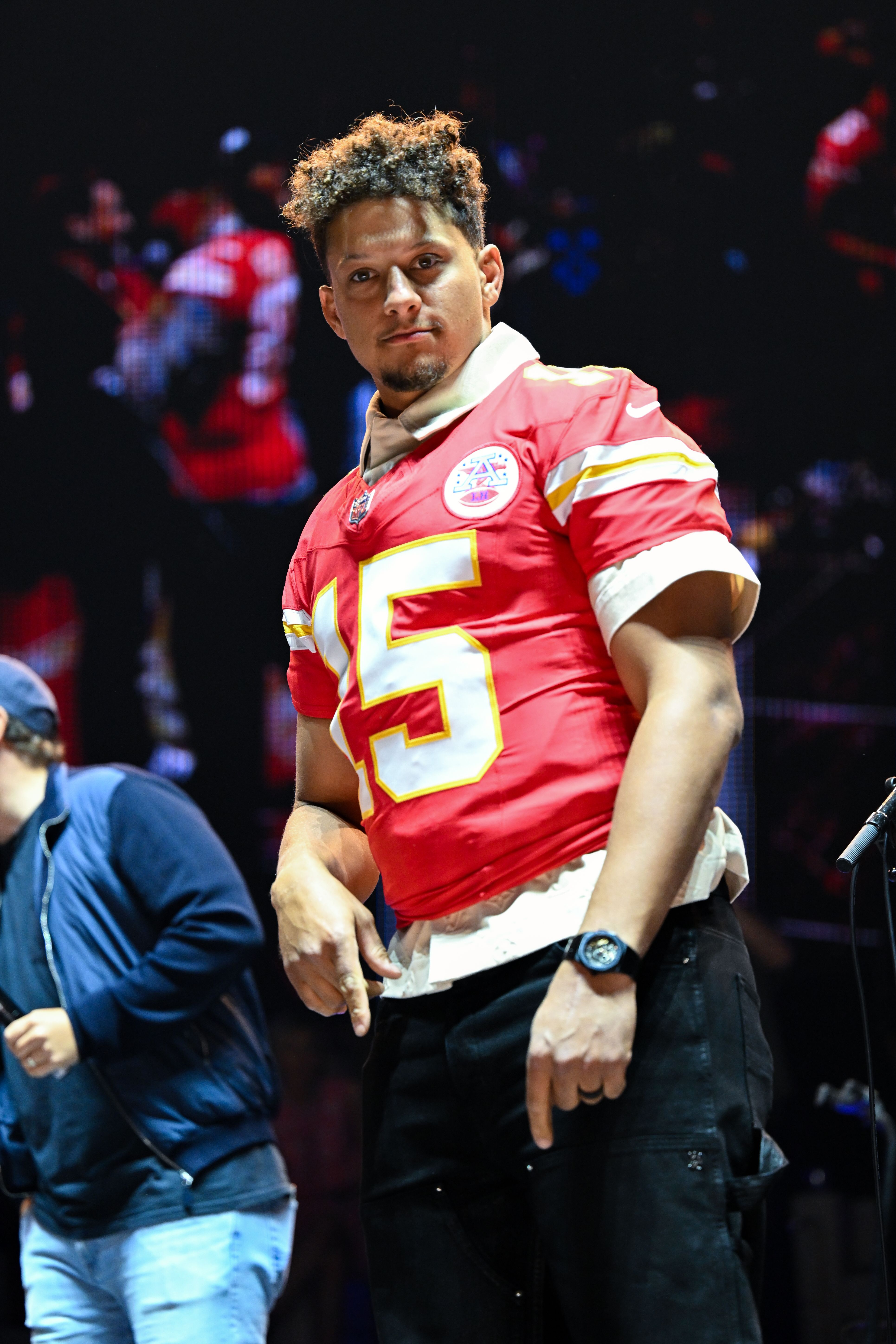 Patrick Mahomes on stage at a charity event