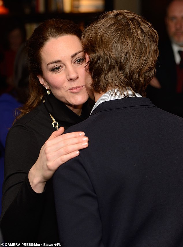 A kiss for Kate: Gilkes attended the 2011 wedding of the Duke and Duchess of Cambridge. Pictured, Gilkes greets Kate at an event in the US in 2014