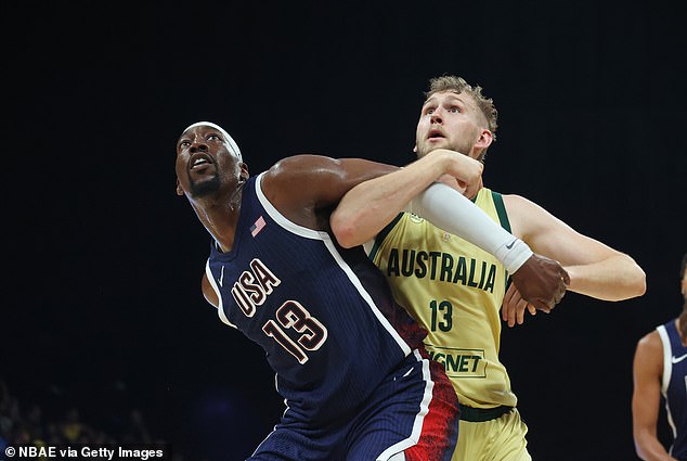 Jock Landale (pictured right with the USA's Bam Adebayo) had a huge game while stepping up as Australia's first -choice big man in the paint