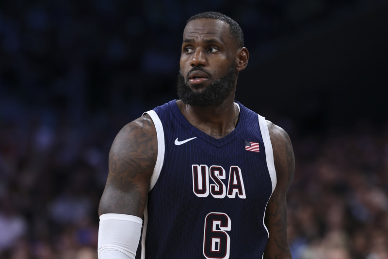 LILLE, FRANCE - JULY 28: LeBron James #6 of Team USA looks on during the Men's Group Phase - Group C match between Serbia and USA on Day 2 of the Olympic Games Paris 2024 at Stade Pierre Mauroy on July 28, 2024 in Lille, France. (Photo by Catherine Steenkeste/Getty Images)