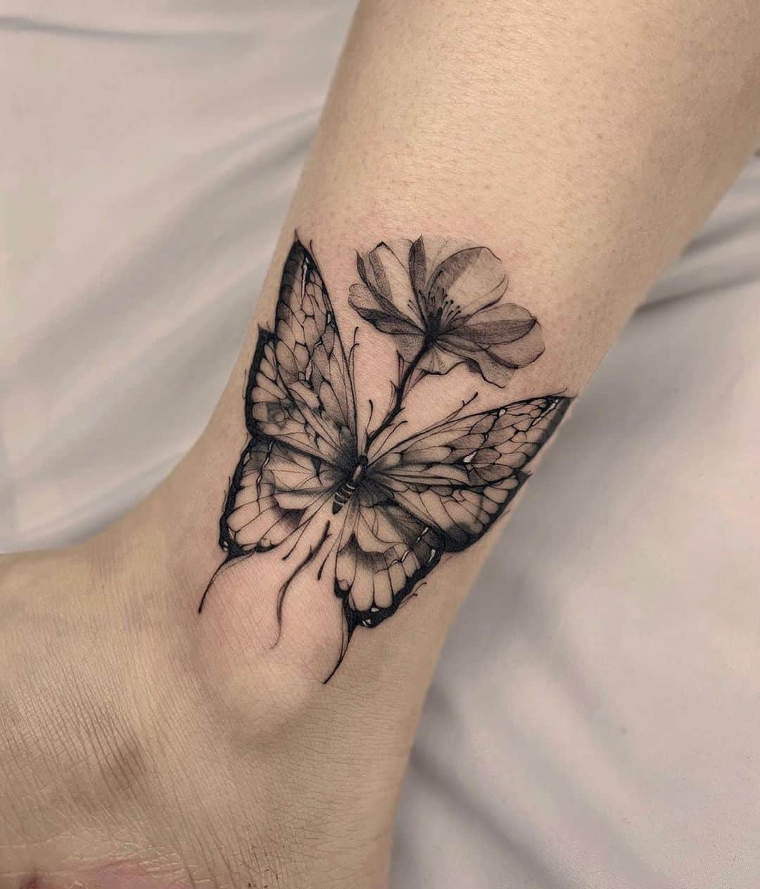 Butterfly tattoo by tattooist hoji