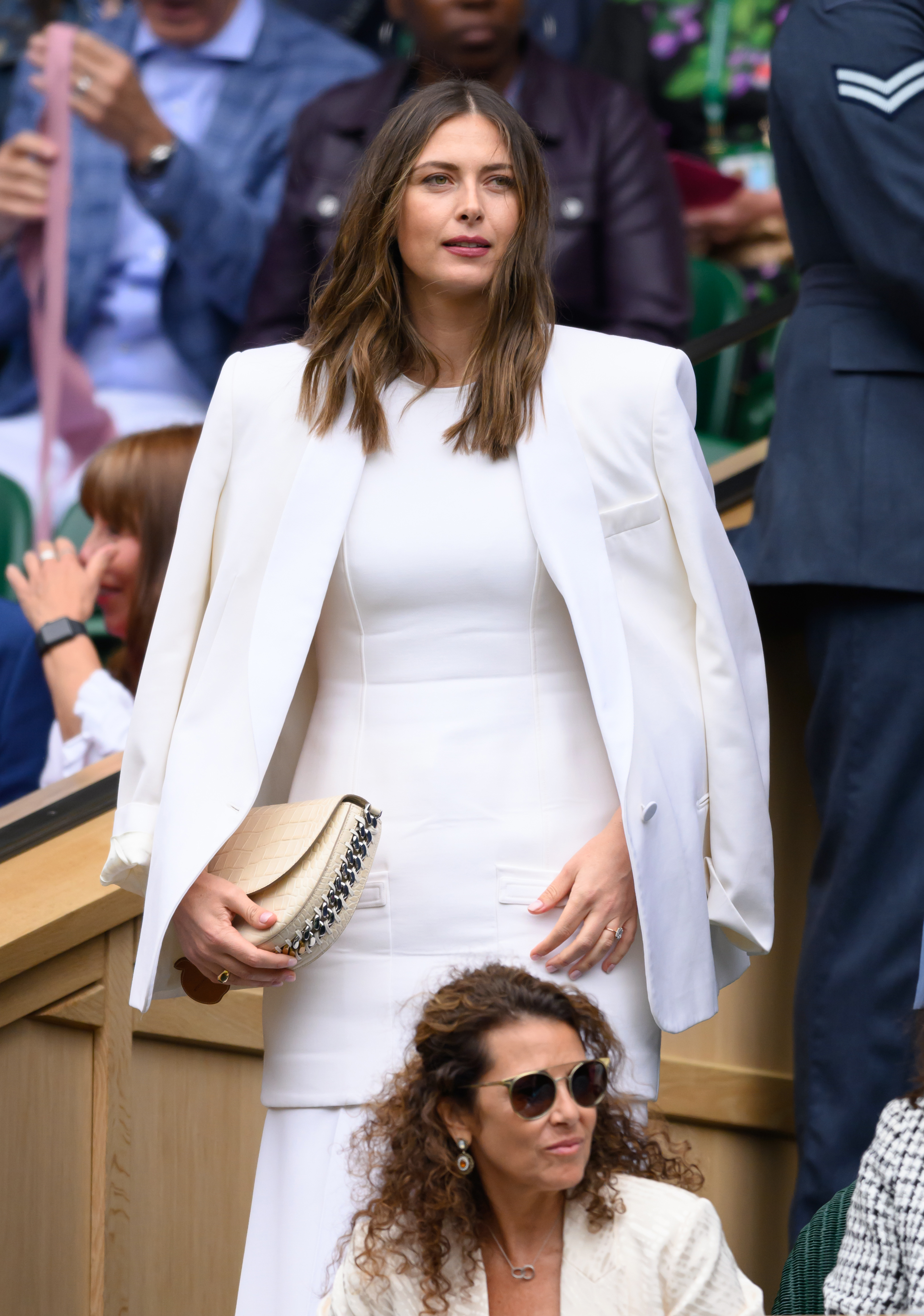 Sharapova stunned in a white number on Centre Court