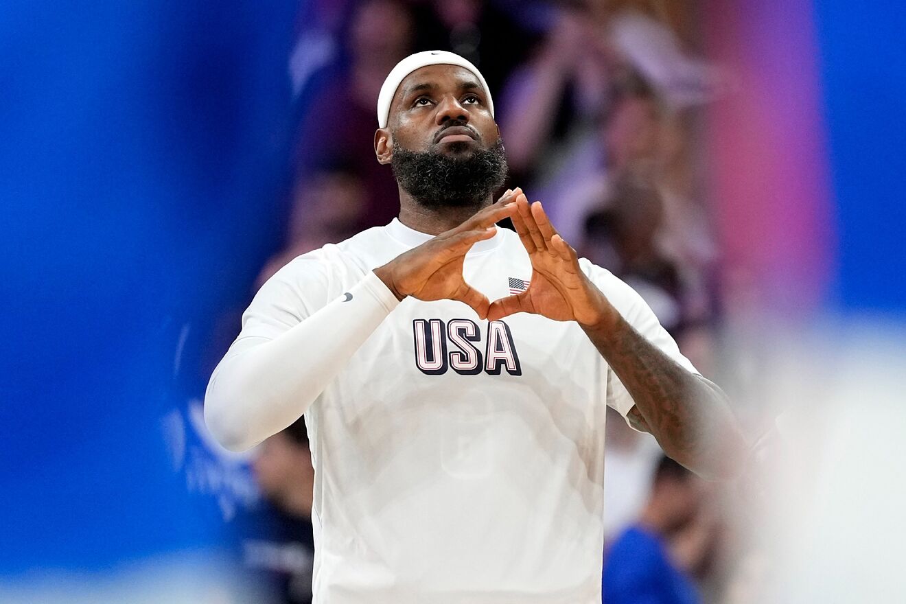 LeBron James, of the United States, gestures during the national...