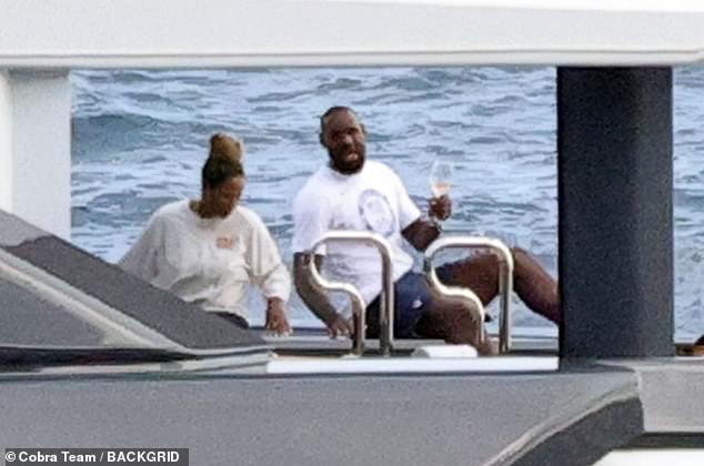 The Lakers legend appeared to enjoy a few drinks while chilling on the lavish vessel