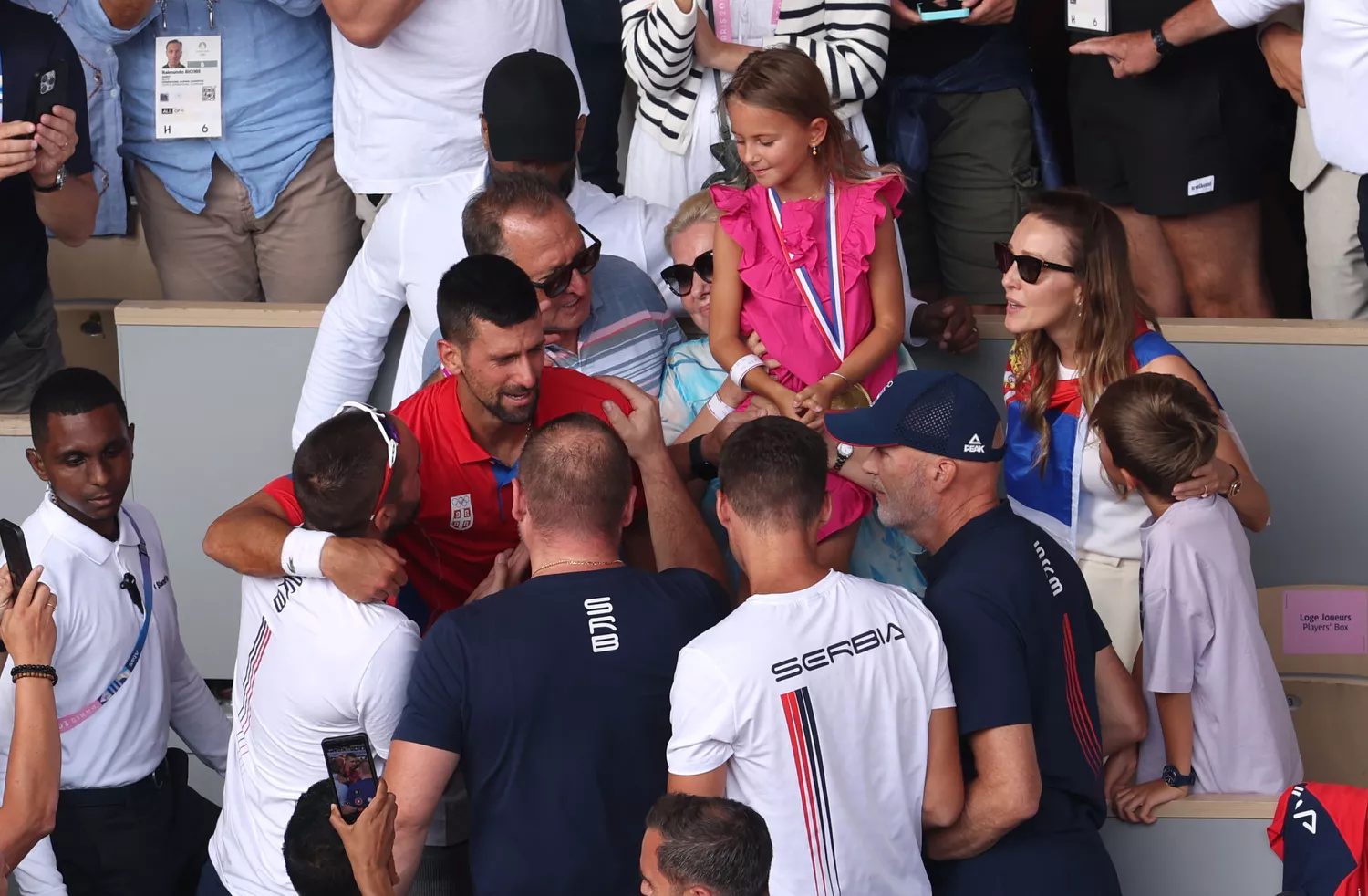 Novak Djokovic of Team Serbia celebrates victory in his player's box during the Men's Singles Gold medal match against Carlos Alcaraz of Team Spain