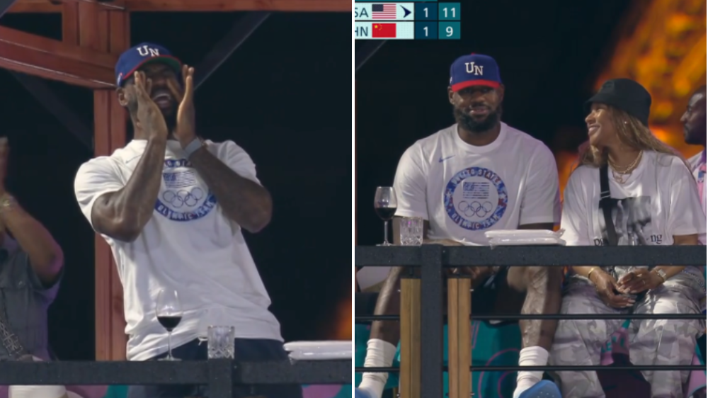 LeBron James appeared to be enjoying the action with a glass of wine