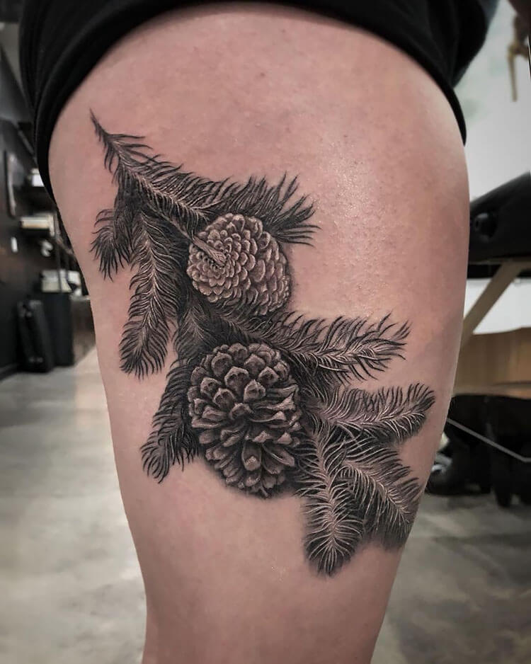 pinecone tattoo on thigh