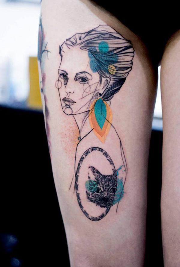 watercolor portrait thigh tattoo