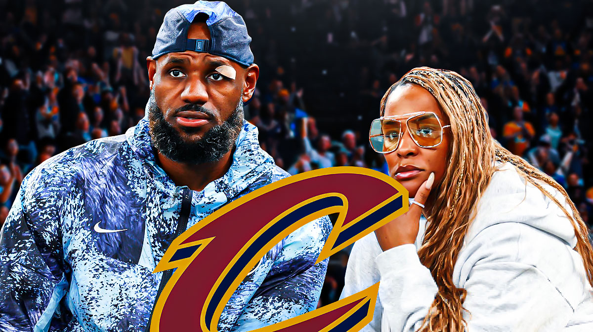 Savannah James next to LeBron James with serious looks on their faces next to the Cavs logo